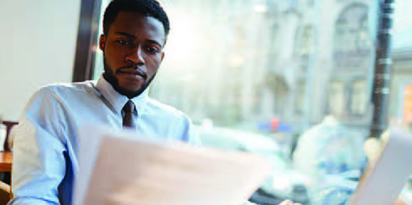 man reading document