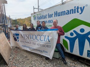 Nisivoccia volunteers participating in Habitat for Humanity build day in Rockaway, NJ