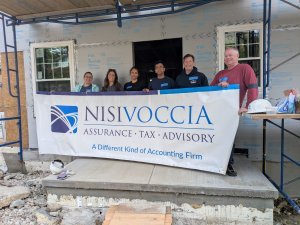 Nisivoccia volunteers participating in Habitat for Humanity build day in Rockaway, NJ