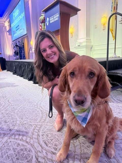kristin anderson posing with dog at NJASEP's special education day APSSD 