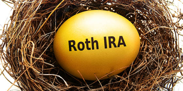 golden egg inside of bird nest with black text over it reading 'Roth IRA'
