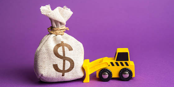 construction vehicle pushing bag of money
