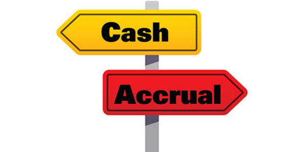 cash or accrual graphic, with signs pointing in opposite directions