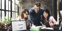 depicts three people working together to determine entity type of business