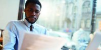man reading document