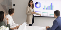 nonprofit board member presenting financial statement to staff